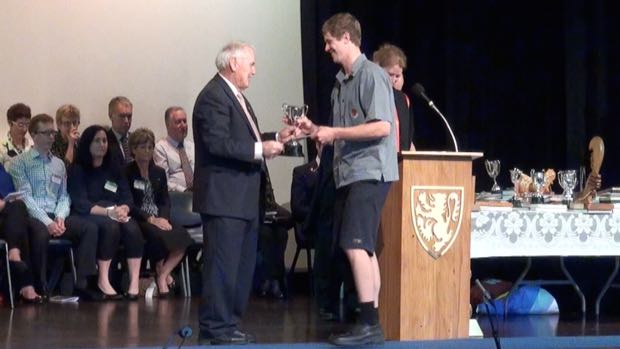 Mr Cave presenting Sports Awards