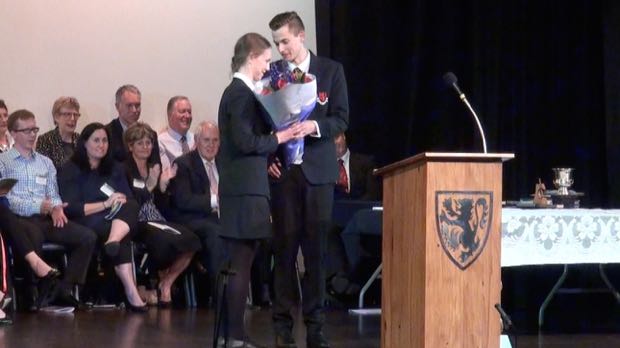 Head Boy congratulates Head Girl